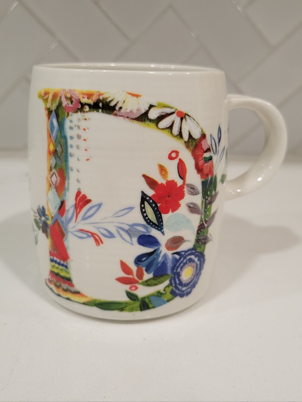 Starla M. Halfmann Anthropologie Floral Letter D Ceramic Mug in White
